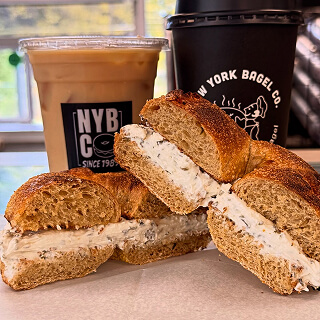 Cream cheese bagel with an NYBC iced coffee